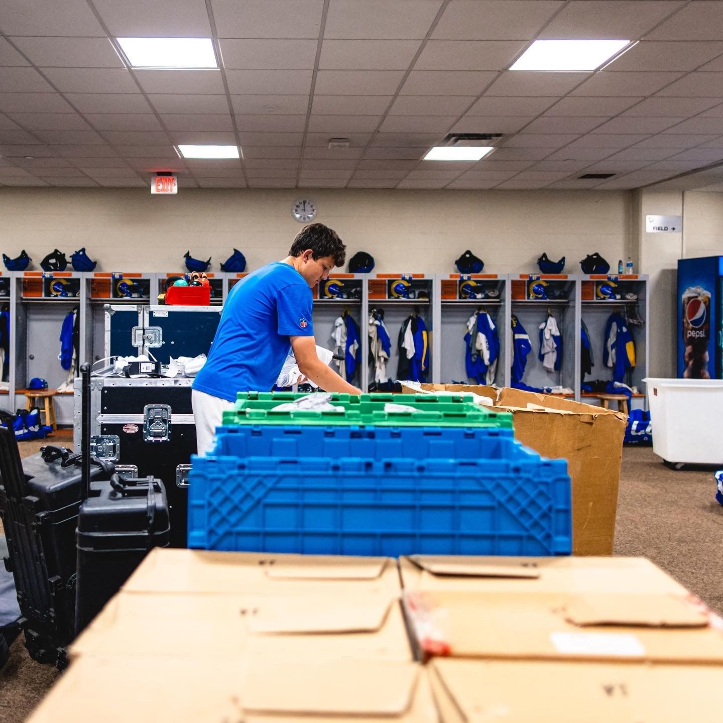 Garrett Lynde working in the locker room